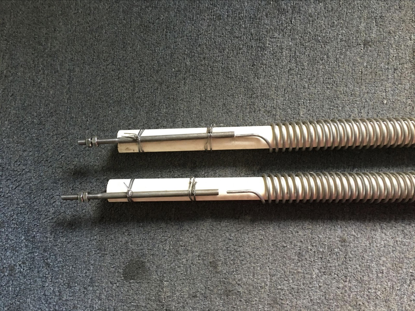 What is the commonly used electric heating element material